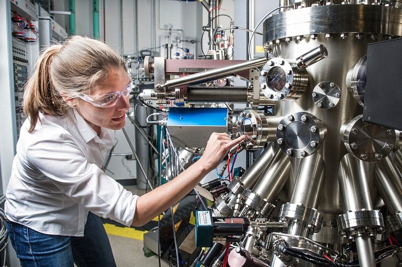 Engineer inspecting advanced process equipment